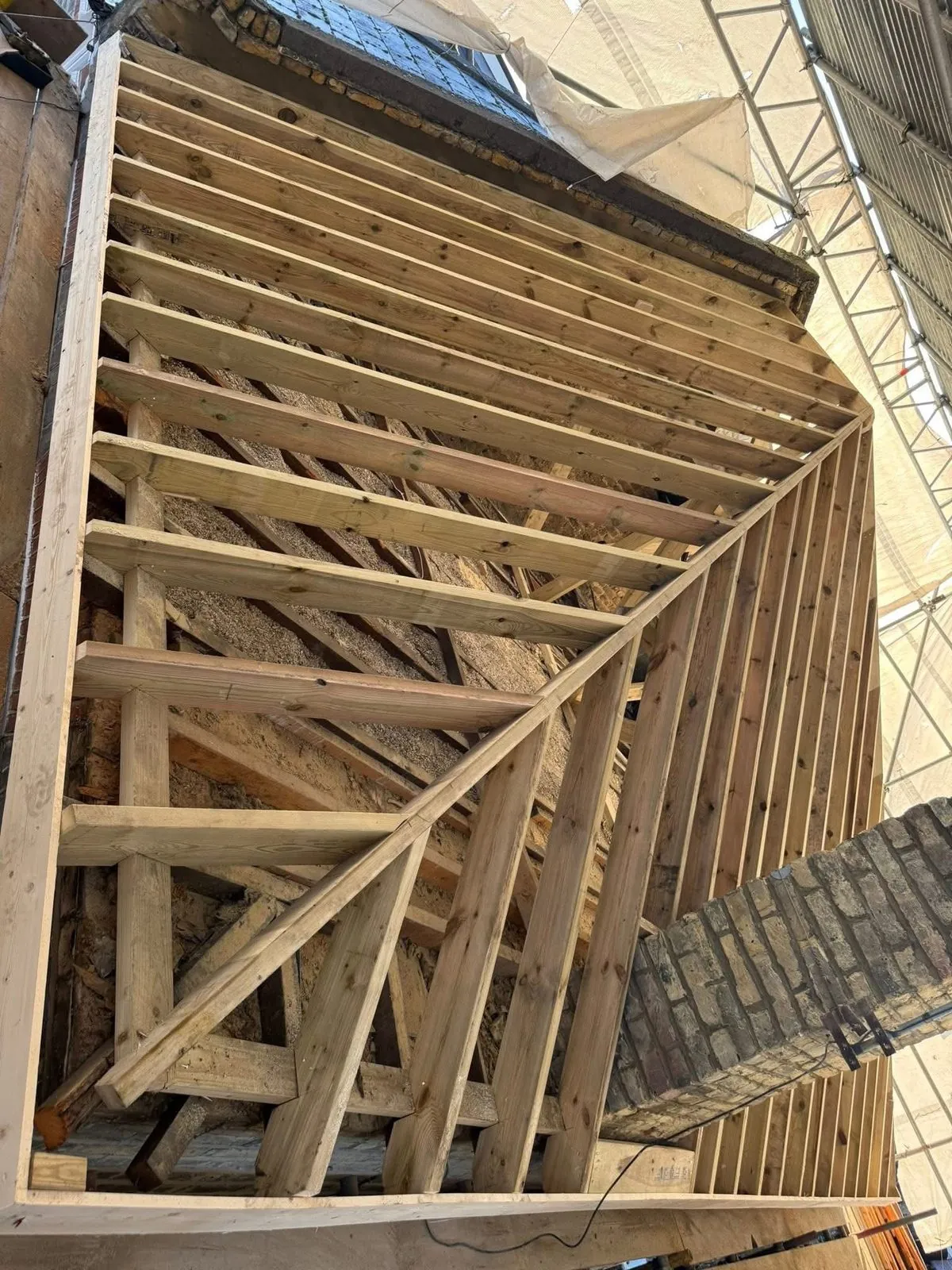 New roof timbers and rafters during a re-roof in Plymouth